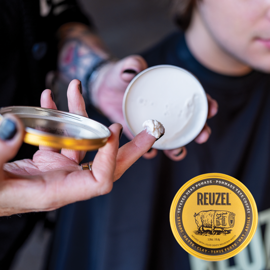 Severed Head clay pomade case of 12 containers, 3.38oz/95g each, featuring a detailed severed head design for styling hair.
