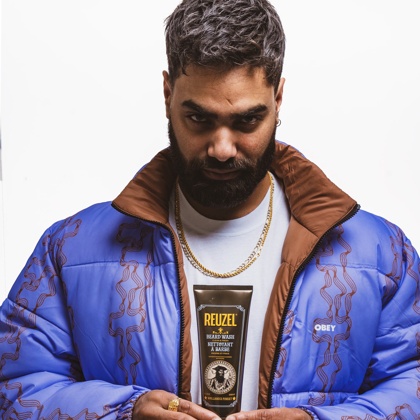 MAN WITH BEARD WASHED WITH REUZEL Beard Wash