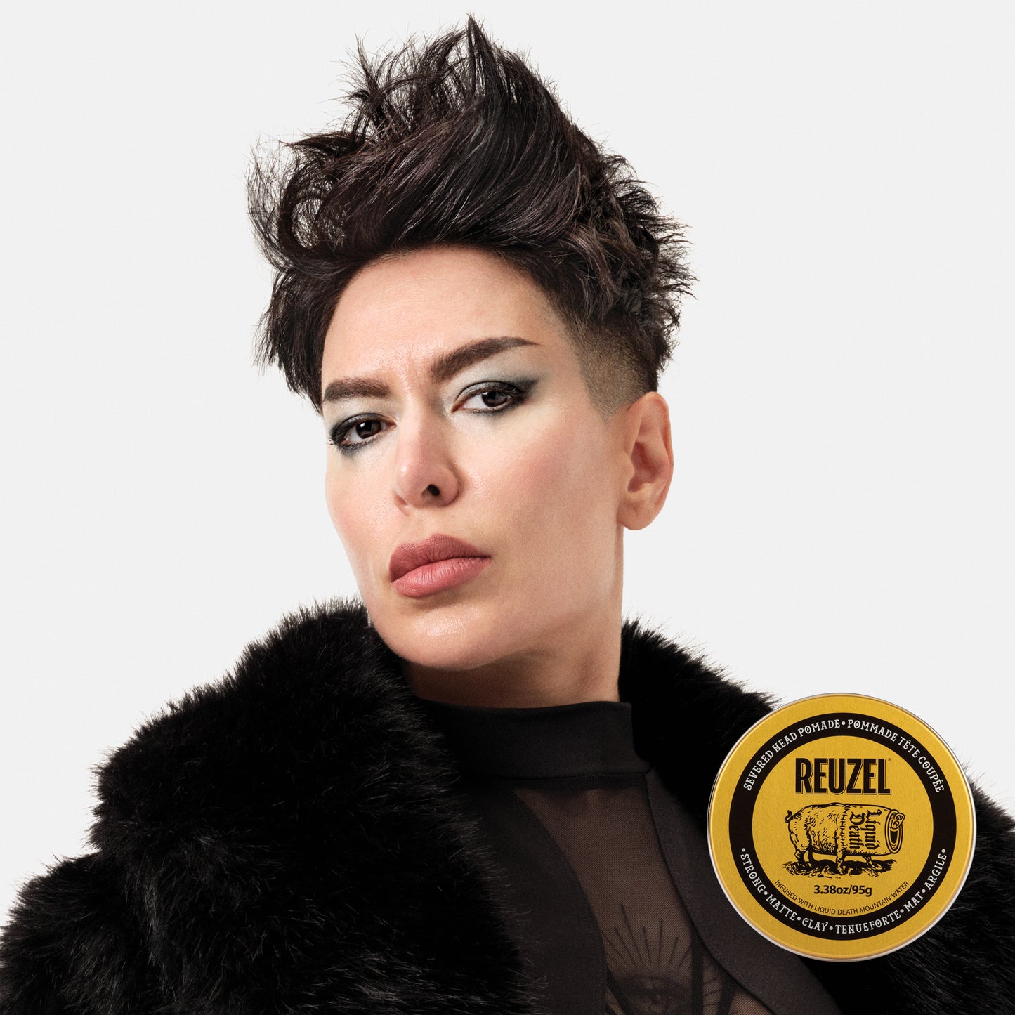 Severed Head Clay Pomade by Vendor in a jar, showcasing a textured clay product for hairstyling.