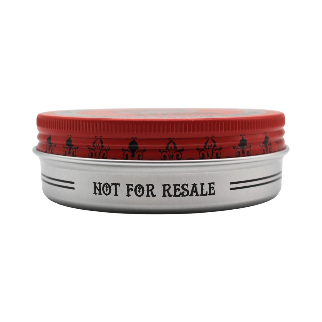 Red Pomade labeled Not For Resale
