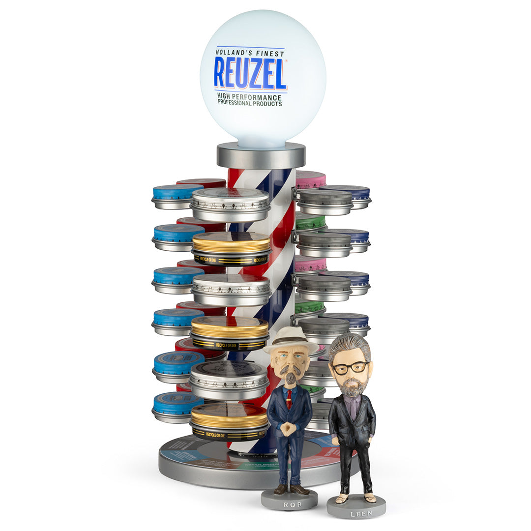 Barber pole display with founders bobblehead figurine, showcasing a vintage-style barber shop decor by Vendor