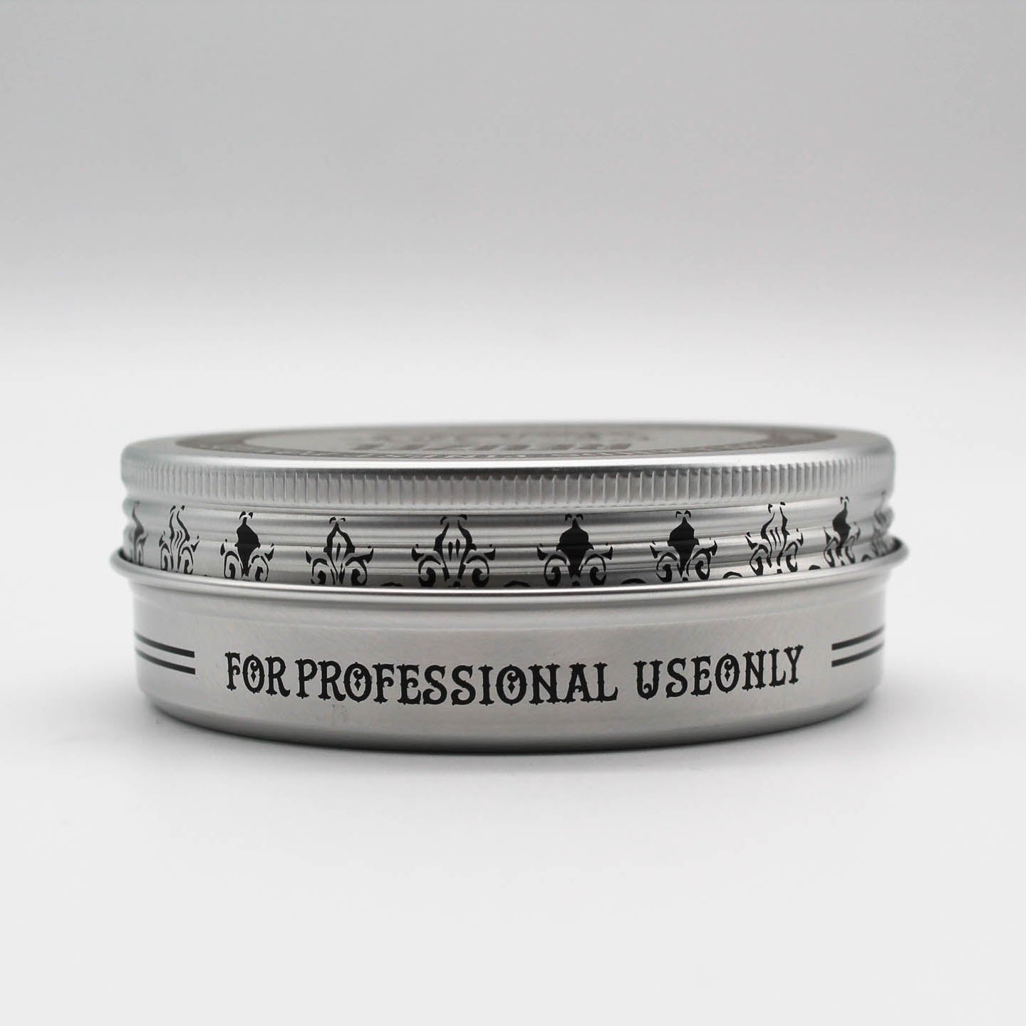 Reuzelinc Concrete Hold Matte Pomade jar with black lid and label, showcasing the product's matte finish and styling hold.