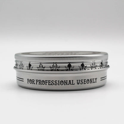 Reuzelinc Concrete Hold Matte Pomade jar with black lid and label, showcasing the product's matte finish and styling hold.