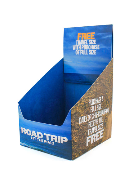 Empty display for Vendor Road Trip Shampoo bottle, showcasing the product packaging and branding on a retail shelf.