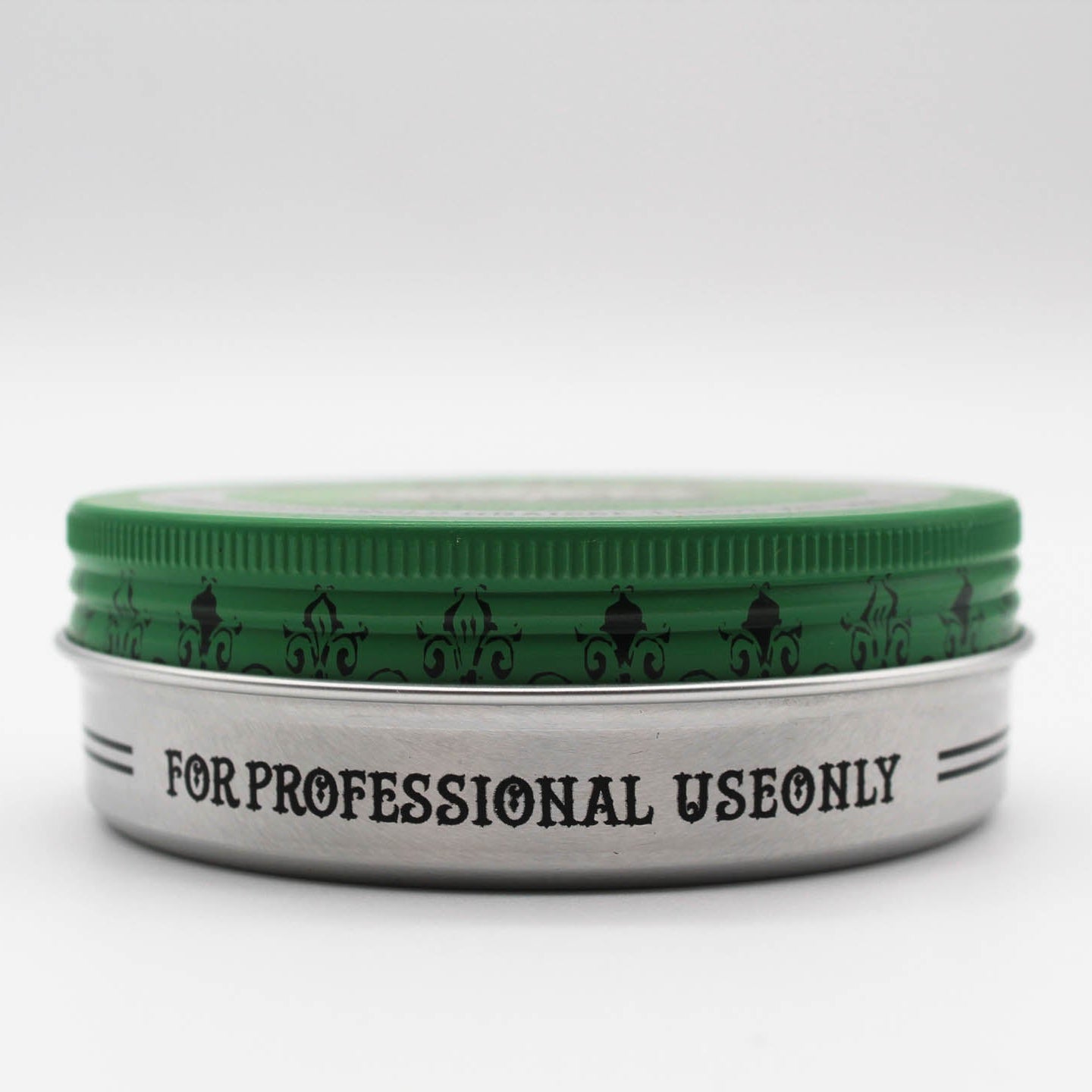 Green Reuzelinc pomade grease jar with green label and lid, showing the thick, shiny hair styling product inside.