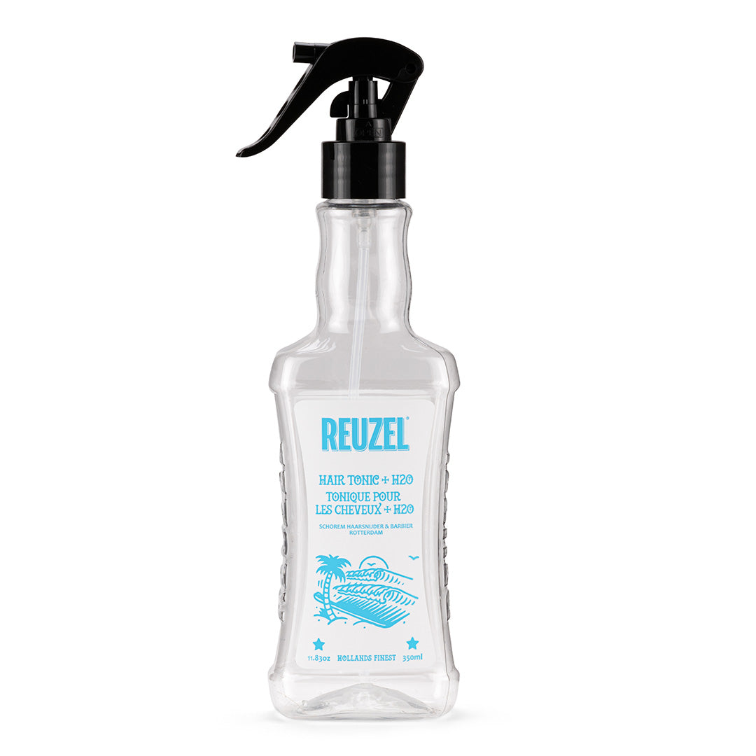 Pro Reuzel hair tonic and spray bottle, front view showing the empty Reuzel spray container and hair tonic bottle.