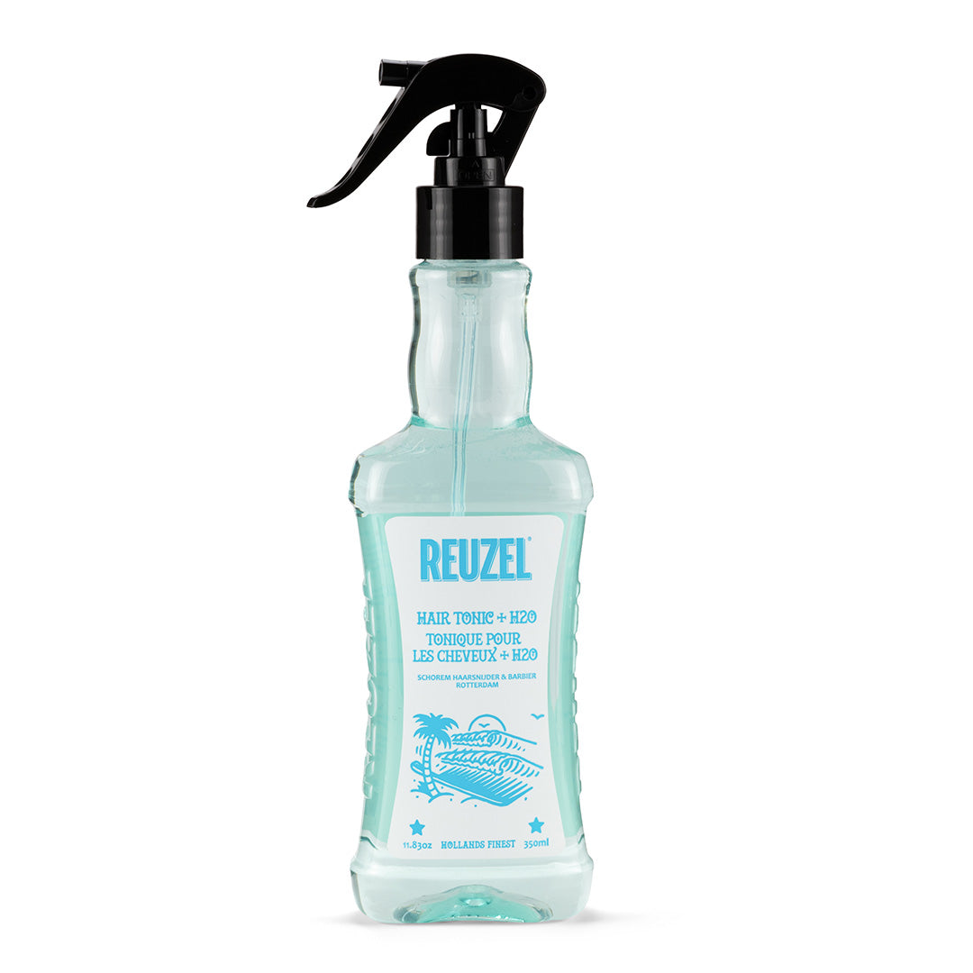 Pro REUZEL hair tonic and Reuzel spray bottle, full front view showing the product packaging and labels.