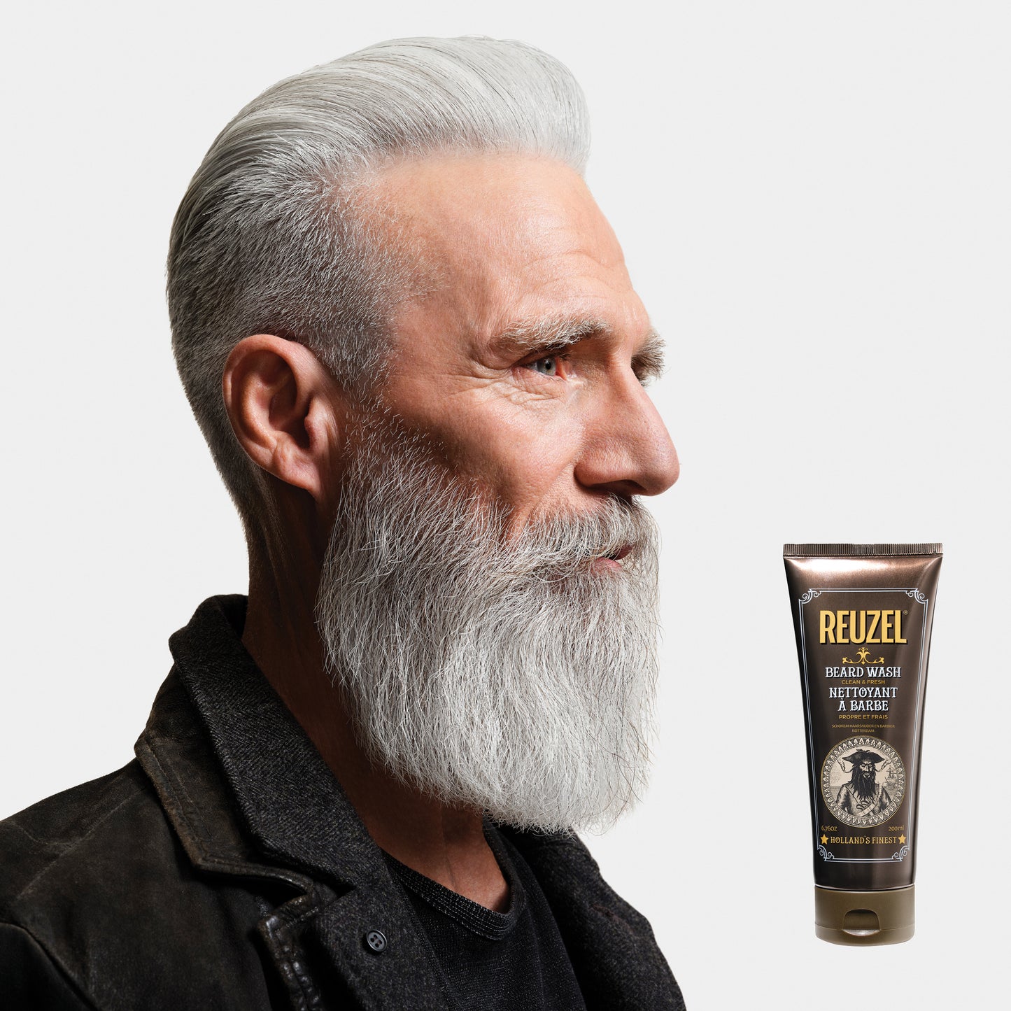 MAN WITH BEARD WASHED WITH REUZEL Beard Wash