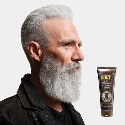 MAN WITH BEARD WASHED WITH REUZEL Beard Wash