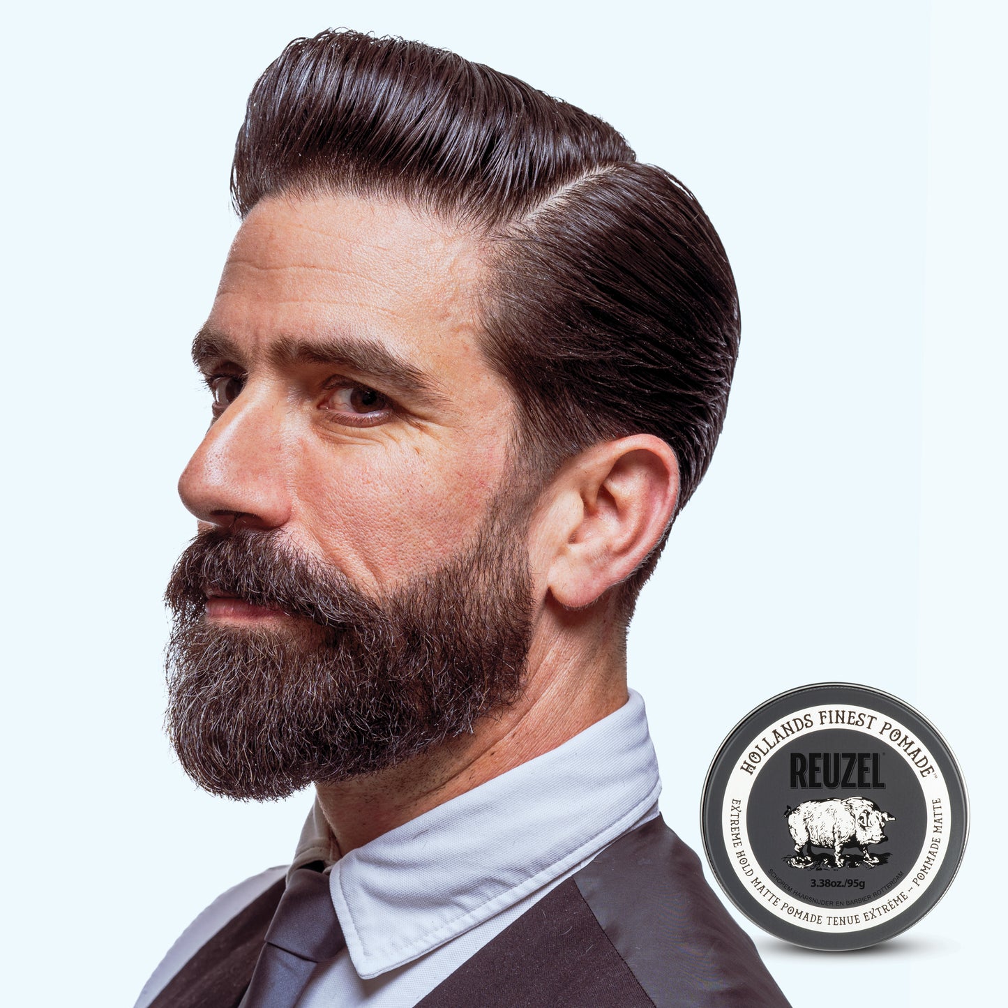 Man with styled hair used with REUZEL Extreme Hold Matte Pomade
