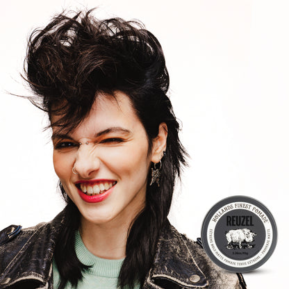 Woman with brown hair styled with Extreme Hold Matte Pomade by REUZEL