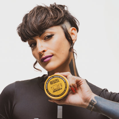 Severed Head Clay Pomade by Vendor in a sleek container, showcasing a textured hair styling product.