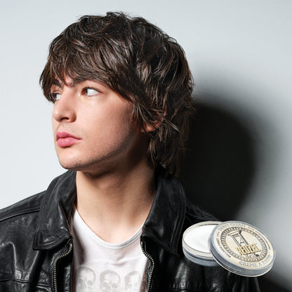 MAN WITH Cleanly shaved face using REUZEL Shave Cream