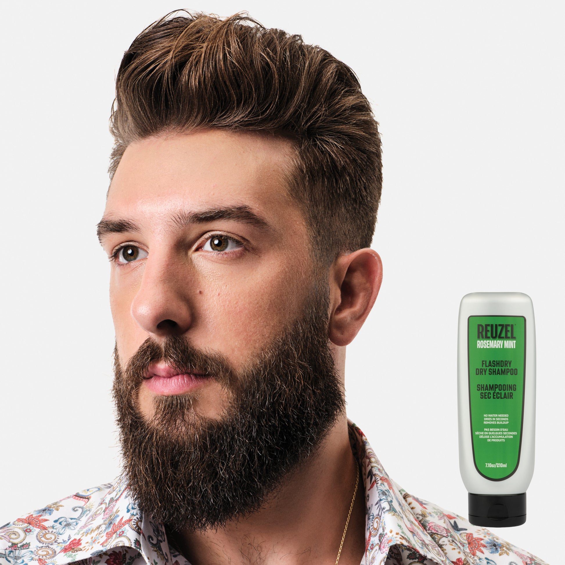 FlashDry dry shampoo by Vendor, a spray bottle with white powder, applied to hair for fresh, volumized look.