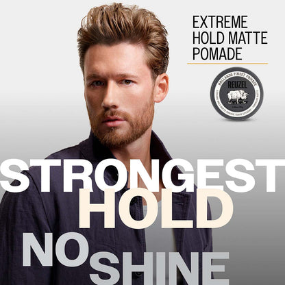 Extreme Hold Matte Pomade by reuzelinc, showing a jar of the matte finish pomade with a black lid and branding on the label.